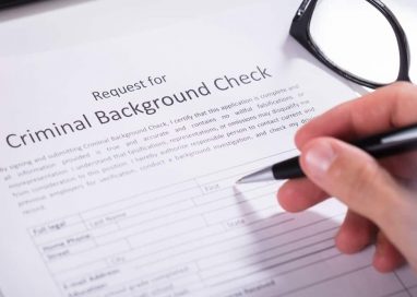 How can I perform a criminal background check on someone?